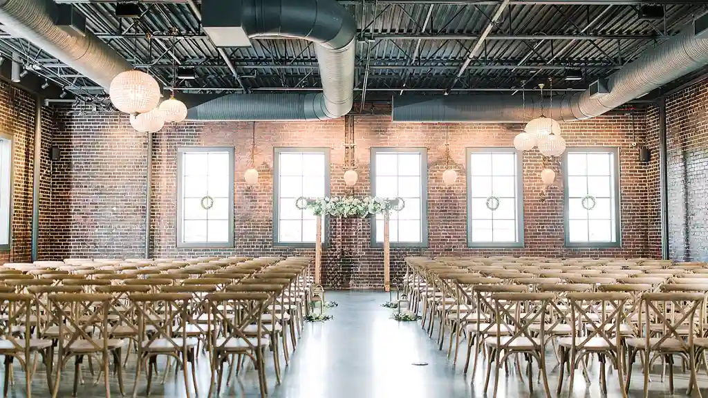 Two mint chocolate milkshakes with whipped cream and green sprinkles.